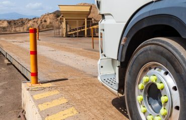 how to get a weighbridge certificate Truck entering a weighing scale in a quarry.